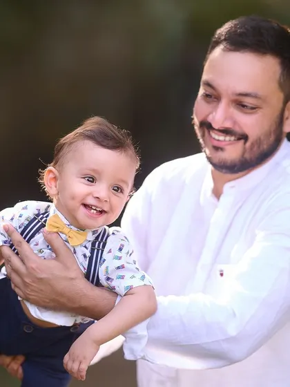 A father sharing a laugh with his son. My goal is to capture these unposed, genuine interactions that reflect the true bond within your family.