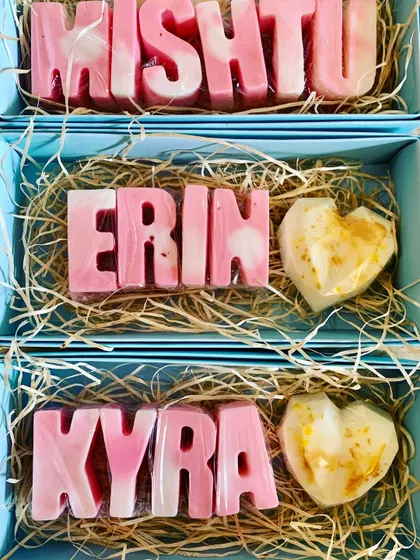 Personalized name soaps are one of my specialties. Here are a few custom orders for Mishtu, Erin, and Kyra, showing the beautiful pink and white pastel design paired with a gold-dusted heart soap.