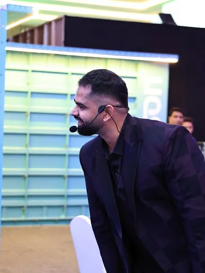 Caught in a moment of interaction during a corporate show. I am always connected with the audience, whether on stage or off, ensuring the event flows smoothly.
