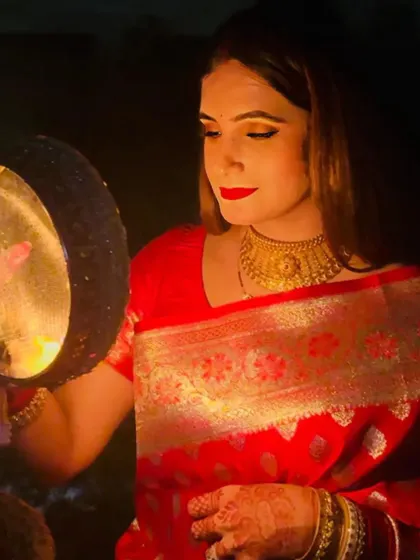 A beautiful solo portrait of Ishvinpal during the Karwa Chauth ritual, radiating grace and devotion.