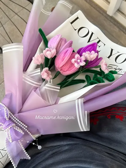 Holding the Korean-style flower bouquet. This new craft is something we're excited to explore, bringing fresh and trendy designs to our collection.
