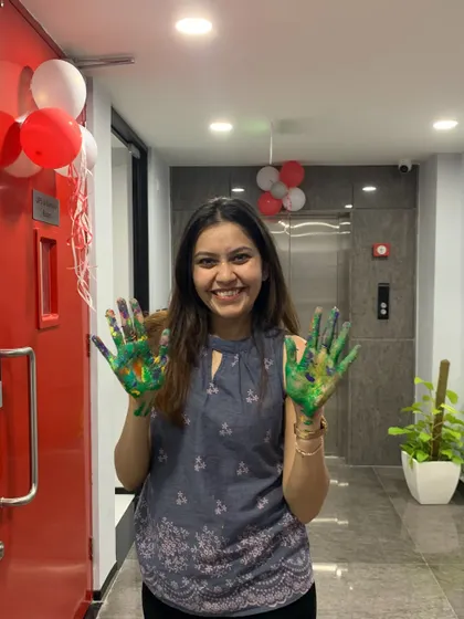 Messy hands, happy heart. This is me after the Kinara Capital mural event, covered in paint but so full of joy. Seeing a team connect and create something so meaningful is why I do what I do.