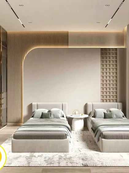 An elegant and spacious bedroom with twin beds, perfect for a guest room or for siblings. The design features a stunning glass and gold-trim wardrobe and a curved, fluted accent wall.