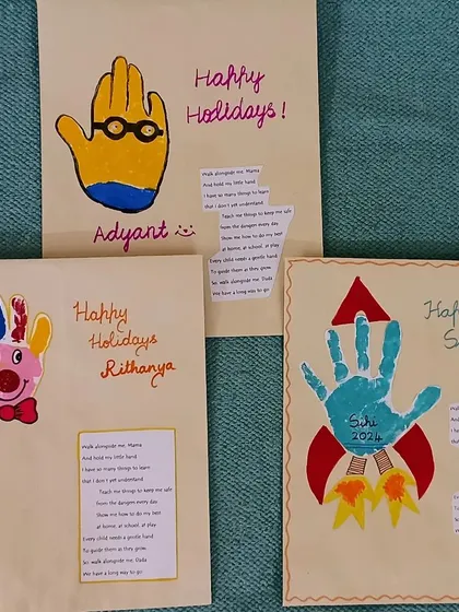 "Happy Holidays" cards made with handprints, turning a simple craft into a personal keepsake.