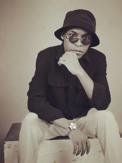 Another look from my photoshoot, reflecting the cool and confident persona I bring to every performance.