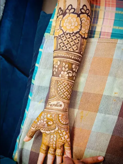 Another shot focusing on the name 'Fardin' integrated into the bridal mehandi.