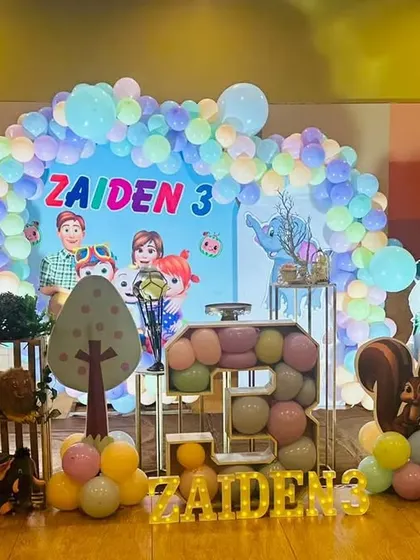 A fun mashup theme combining Cocomelon and Jungle elements for a third birthday. We can mix and match themes to create a unique party for your child.