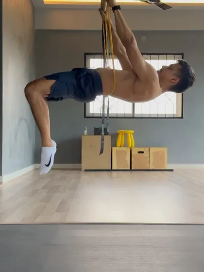 A band-assisted front lever on the rings. This is a great way to accumulate volume and build the strength needed for the unassisted version.