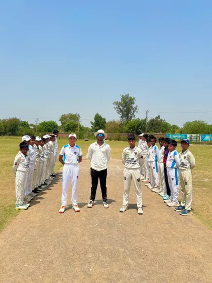 The two teams lined up before the 2nd match of the Summer Cricket Cup.