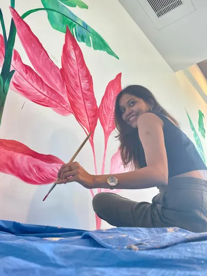 A happy moment during the creation of a vibrant tropical mural. Working with bright, popping colors always makes my day brighter.