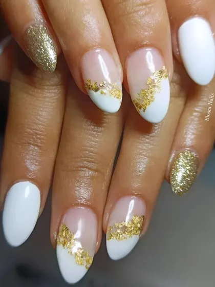 A modern and chic design featuring a combination of solid white, negative space, and gold foil. The gold leaf is carefully placed to create an abstract pattern that is both artistic and sophisticated.