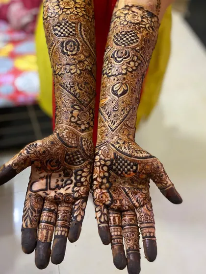 This is a detailed view of my intricate bridal henna work. Each design is unique, combining traditional patterns like paisleys and mandalas with fine-line fillers to create a stunning, full-coverage look for your special day.