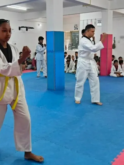 Students practicing a double knife-hand block.