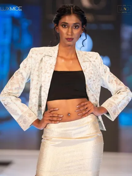 A modern, chic look for The Luxo Show. The makeup is minimal and bronzed, paired with a braided hairstyle and tendrils to create a youthful and edgy vibe.