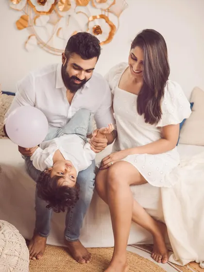 Playful moments are the best moments. We encourage tickle fights and games to bring out the most natural smiles during our family photoshoots.
