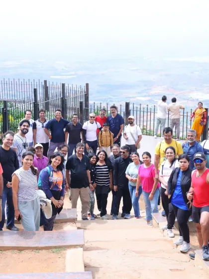 The happy faces of a medical team after a successful morning trek to Nandi Hills. We believe that time in nature is a powerful form of therapy and rejuvenation.