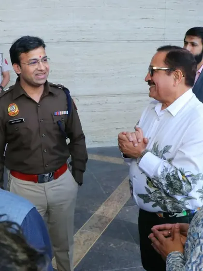 A moment of interaction with our chief guests at the exhibition, discussing the importance of art and creativity.