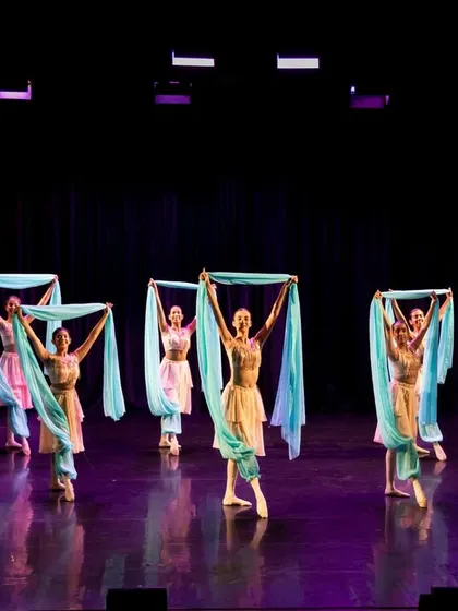 A glimpse of the drama from "La Bayadère." This performance highlights our use of props, such as the flowing blue scarves, to create visual spectacle and convey the story's exotic setting.