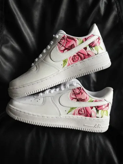 A top-down view of the rosé floral custom sneakers.