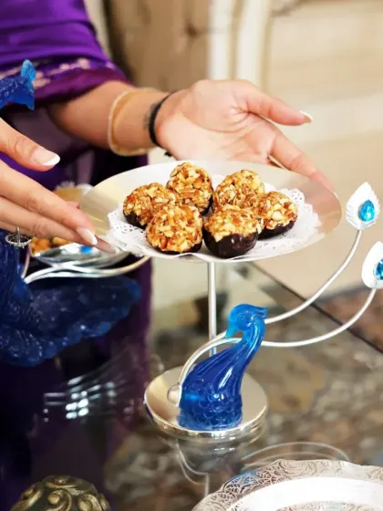 A sweet celebration, elevated. My statement peacock serveware, with its unique blue resin and silver details, makes any gathering feel royal and adds a pop of color to your table.