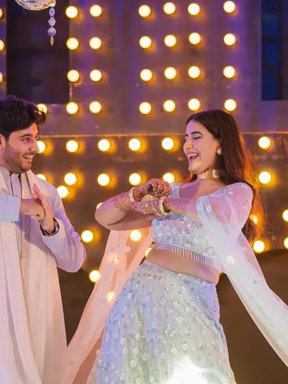 The joy on their faces says it all! This candid moment from a couple's performance shows the fun and happiness I aim to bring to every wedding dance routine.