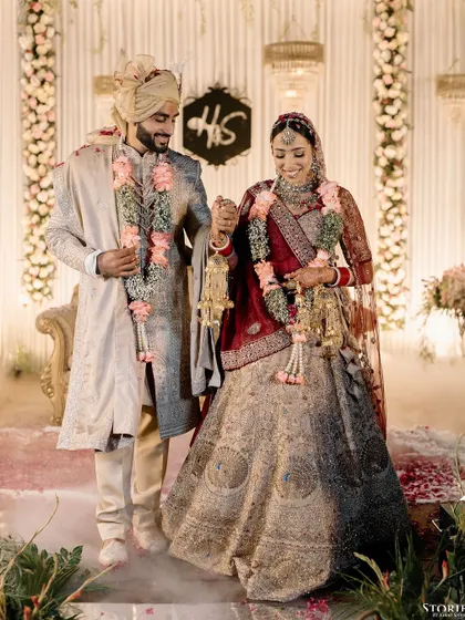 The couple walking hand-in-hand after their ceremony, a perfect concluding shot.