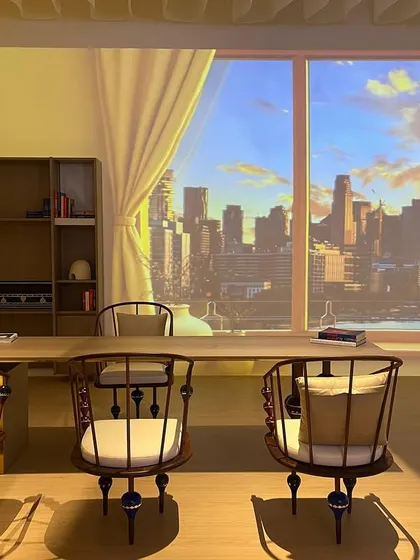 A mock-up of an office space created for an exhibition. This setup showcases our vision for modern workspaces, with clean lines, natural materials, and a connection to the outdoors, even if it's a virtual view.