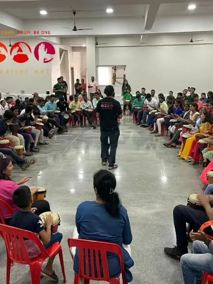 A facilitator's view of the inclusive drum circle. My role here is to guide and hold the space, allowing the group's inherent rhythm and energy to emerge. It's a privilege to witness this process.