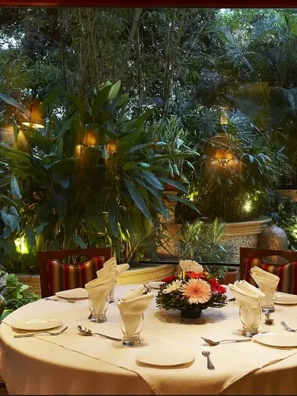 Enjoy dining with a view of my lush garden. It's a peaceful setting for a memorable meal.