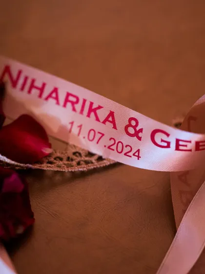A personalized ribbon with the couple's names and wedding date. We use these small details to brand the celebration and make it uniquely theirs.