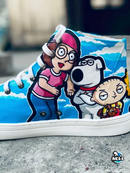A close-up of the Family Guy characters Meg, Brian, and Stewie on the custom painted sneakers.