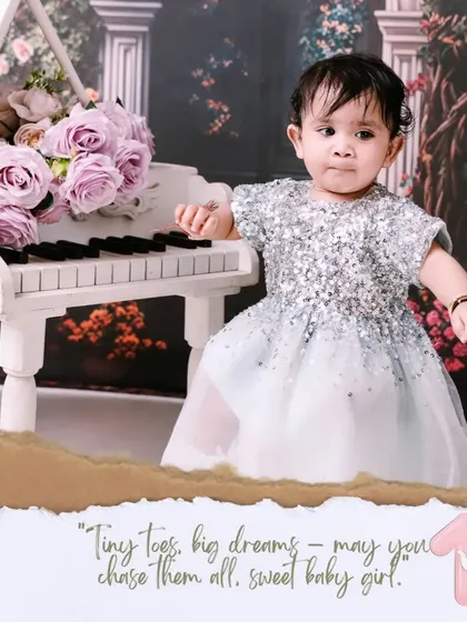 Tiny toes, big dreams. A glamorous first birthday portrait with a sparkling dress and a miniature piano, perfect for your little star.