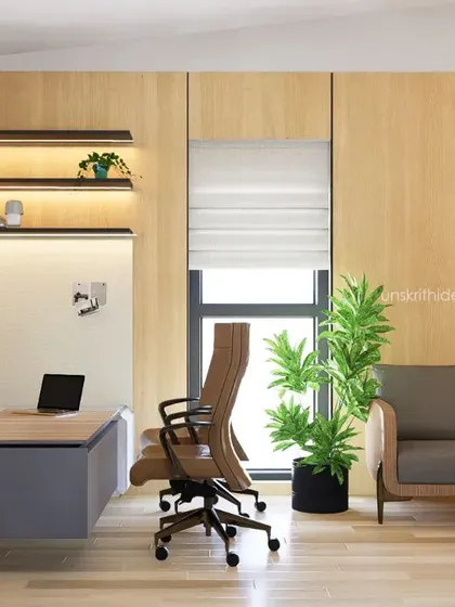 The brief for this CEO cabin was warm, bright, and compact. We used light wood paneling, a floating desk to create a sense of space, and integrated shelving with warm backlighting. The result is an elegant and functional cabin that feels both professional and comfortable.