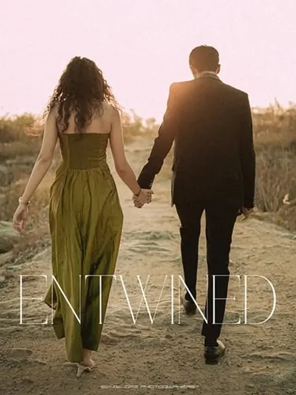 The word "Entwined" overlaid on a photo of the couple walking hand-in-hand. This stylistic choice emphasizes the theme of their journey and connection.