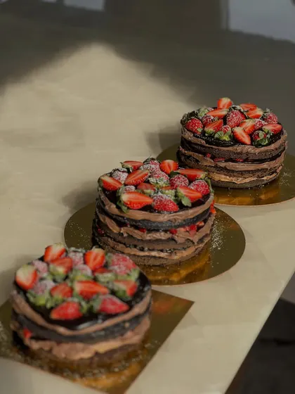 A trio of our mini layered chocolate and strawberry cakes. These are perfect for small gatherings or when you want to try a few different things.