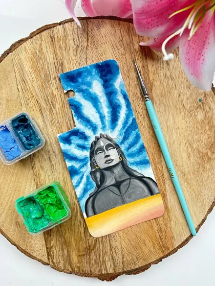 The unboxed artwork for the Adiyogi phone cover. This shows the painting on paper before it's inserted into the clear phone case, highlighting the details of the brushwork.