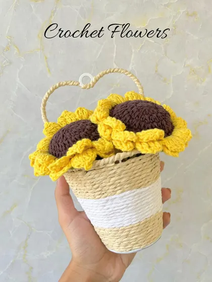 A basket of our crochet sunflowers, perfect for car decor or as a unique centerpiece for your home.