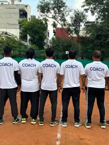 This is our team. We are a unit of dedicated coaches committed to building the next generation of tennis champions. We are on the court with our players, guiding every forehand, backhand, and serve.