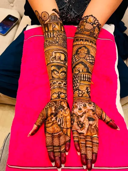 A mirror image of image 39, this shows another angle of the intricate storytelling design with doli, varmala, and other custom scenes.