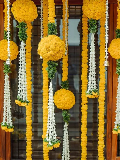 A duplicate image of the beautiful hanging floral decorations, perfect for a vibrant Haldi ceremony.