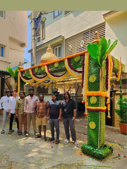 I am proud to stand with my team in front of a completed chappara. This is the result of our hard work and the traditional skills that I want to pass on to my students.