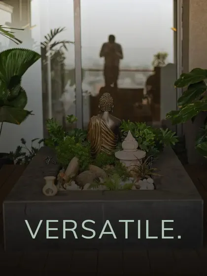 This marketing image highlights my versatile design approach with a miniature Zen garden on a terrace. A Buddha statue sits among carefully arranged plants and rocks, creating a small yet powerful pocket of serenity.