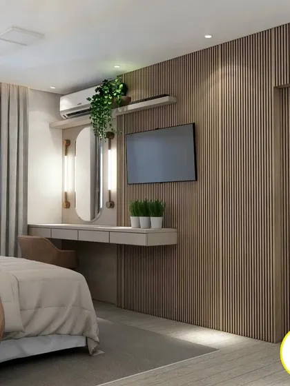 A bedroom with a warm, natural aesthetic, using wood fluting for the entire wall behind the TV and dressing table.