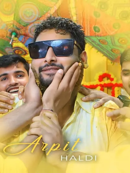 Haldi-kissed smiles and hearts full of love. The groom looking cool in sunglasses during his fun-filled haldi ceremony.