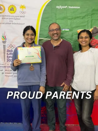 The proud parents of our Mini Olympics medalist, Ruthwa. The support of family is an essential part of an athlete's journey.