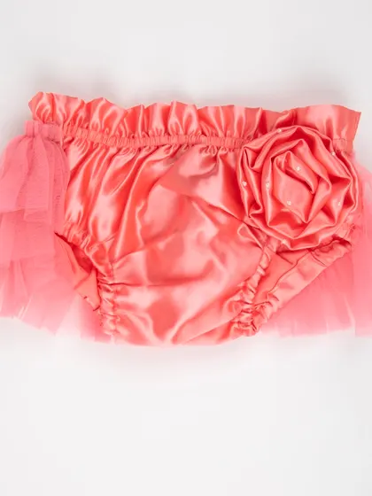The back view of the coral satin diaper cover with a large rose.