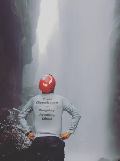 A graduate looks towards the next challenge. Our courses are designed to empower you for a lifetime of exploration.