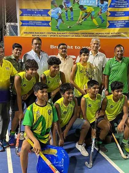 The St. Stanislaus team with officials and supporters after their win at the Willingdon Catholic Gymkhana.