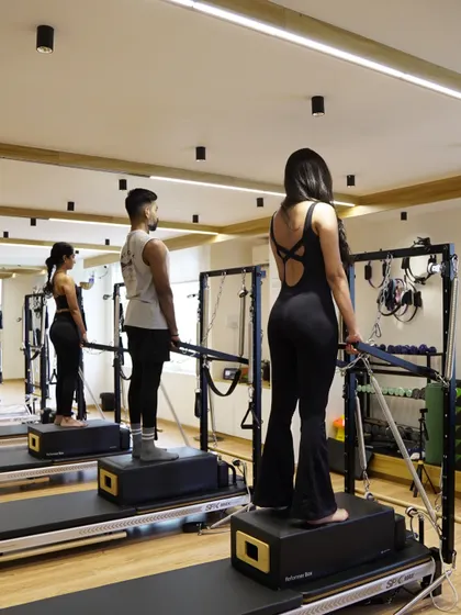 It's a workout, but it's also a community. I love seeing everyone in a group class find their focus and flow together on the reformers. We keep the energy up and the movements precise.
