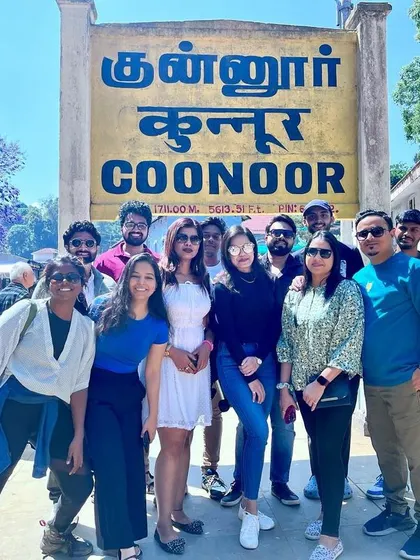 A mandatory group picture at the iconic Coonoor railway station sign during our Ooty trip. Capturing memories from the Nilgiri hills.